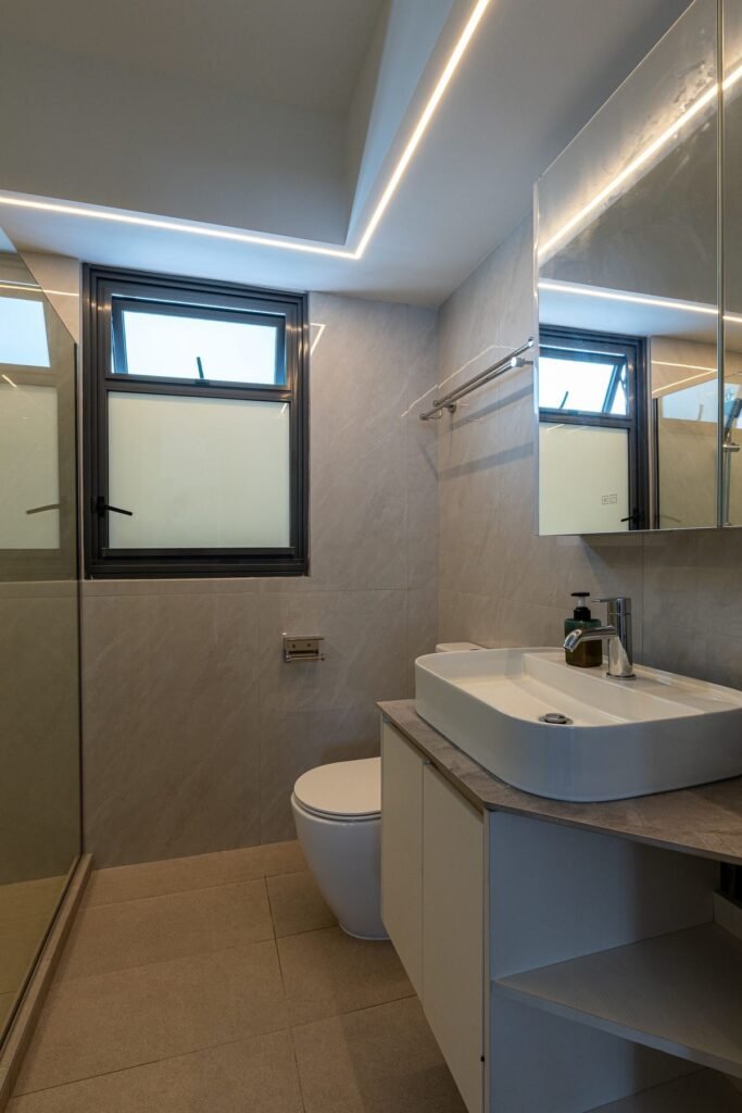 Bathroom with floating vanity and mirror cabinet