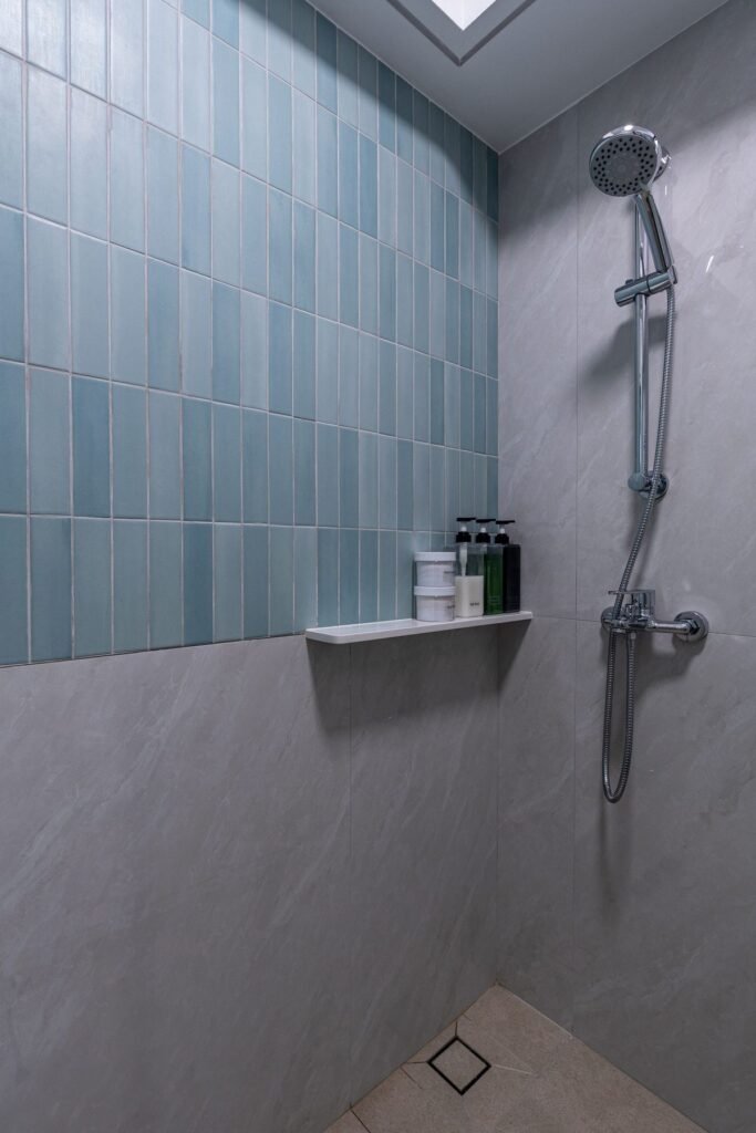 Shower with sea-glass blue tiles