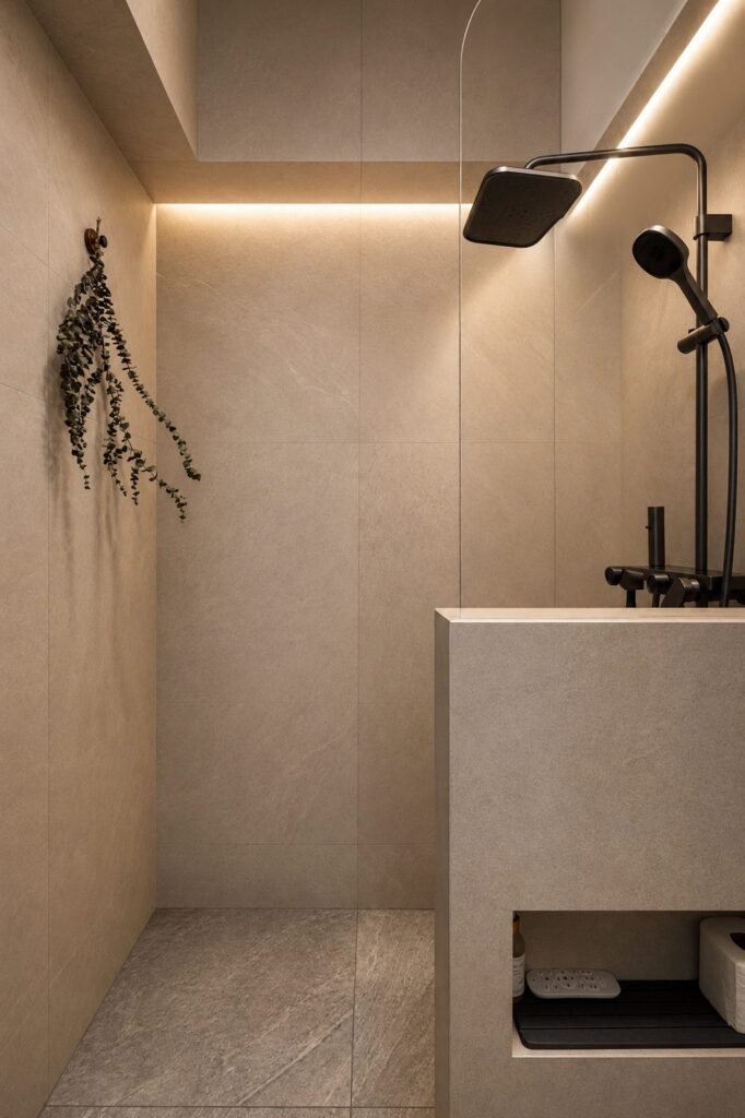 Shower with stone-look tiles and a built-in niche