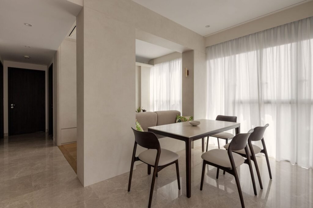 Dining area with a walnut table by the window