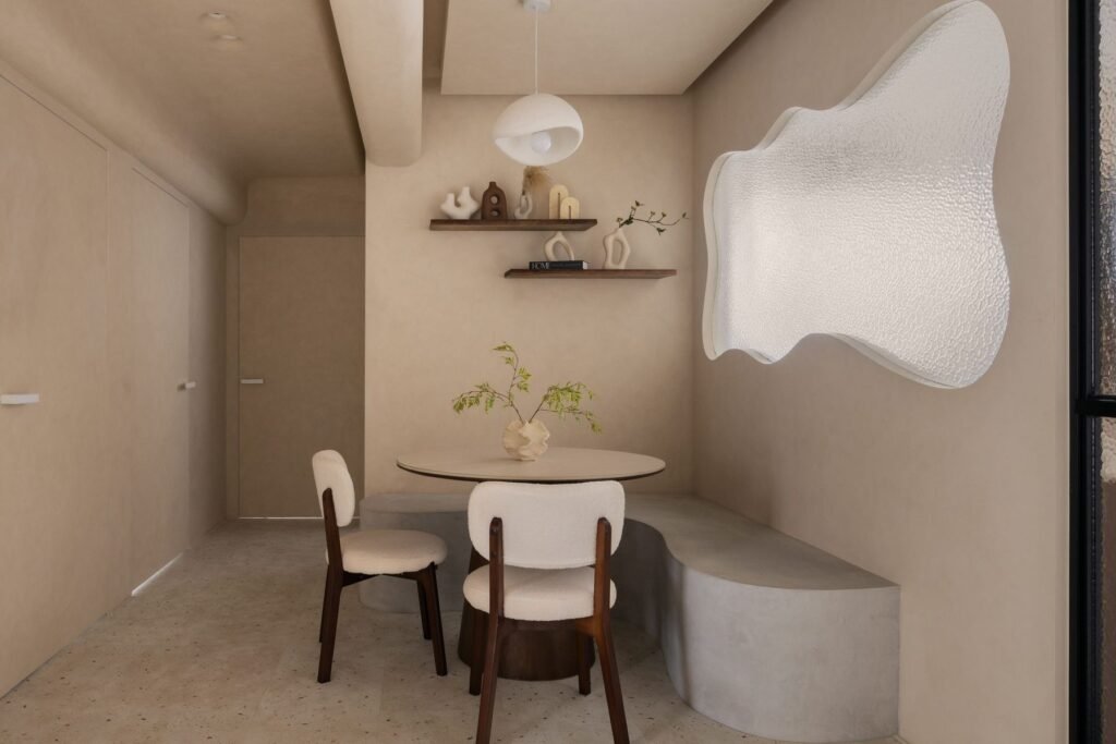 Dining nook with built-in bench and floating shelves
